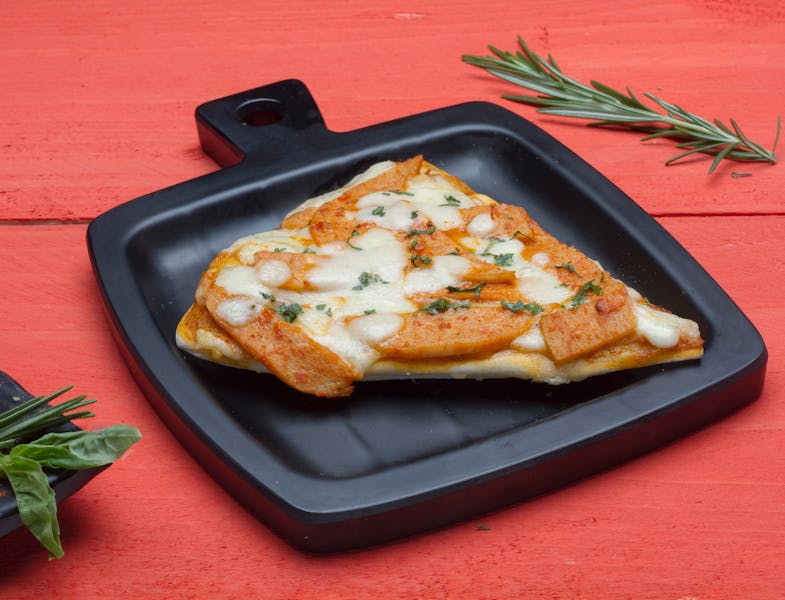 Juicy classic burger with crispy fries on the side from Pequod's menu